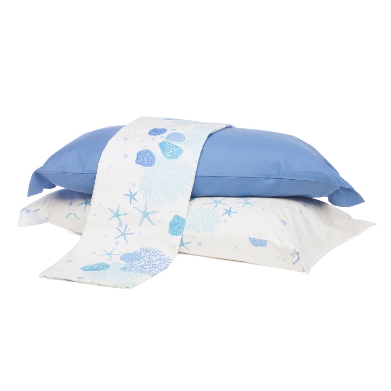 Colore e tessuti leggeri: la casa si veste d’estate