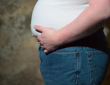 Obesità maschile: rischio salute a causa livelli alti lipidi